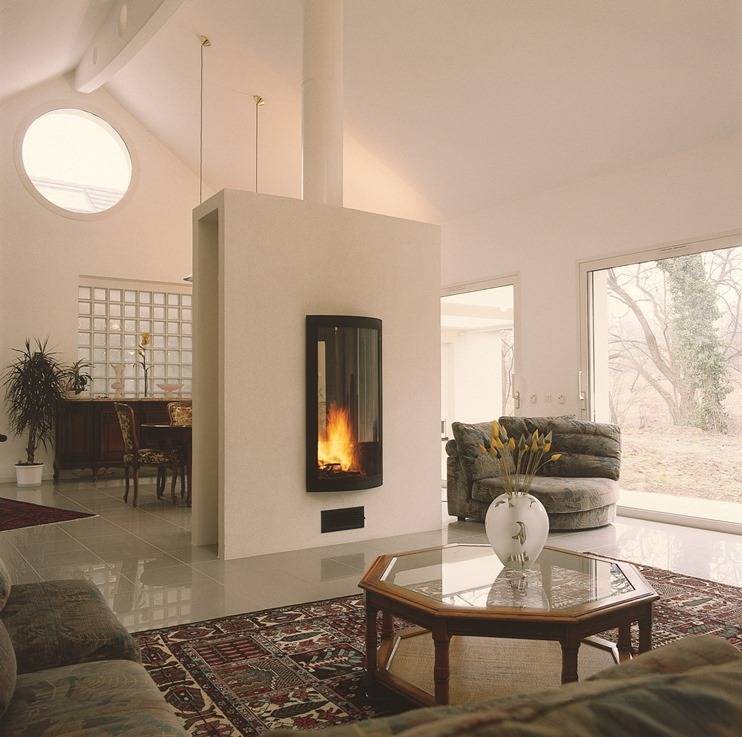 Дизайн гостиной с камином: подборка фото красивых интерьеров